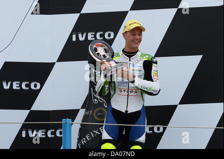 Assen, Paesi Bassi. Il 29 giugno 2013. Dominique Aegerter (Technomag Carexpert) durante la gara a TT Circuit Assen. Credito: Gaetano Piazzolla/Alamy Live News Foto Stock