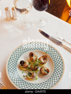 Il francese la raffinata cucina del ristorante L'Escargot ristorante Soho di Londra. Foto Stock