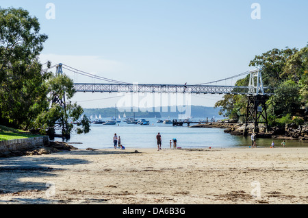 Prezzemolo Baia di Sydney con la sua baia, ponte pedonale, spiaggia ed erboso riserva. Foto Stock
