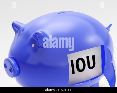 IOU In Piggy che mostra i debiti della disoccupazione e di recessione Foto Stock