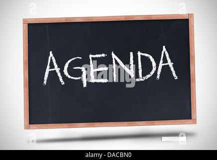 Agenda scritta sulla lavagna Foto Stock