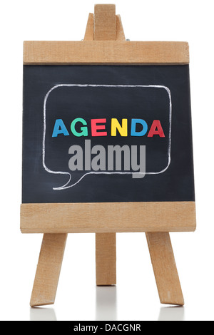 Agenda scritta su una lavagna con lettere colorate Foto Stock