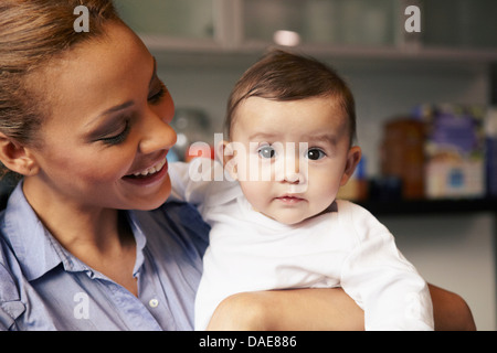 Azienda madre bambina Foto Stock