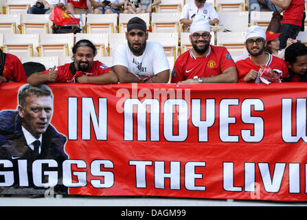 Bangkok, Tailandia. Il 12 luglio 2013. Il Manchester United ventole a Rajmalanga Stadium. Il Manchester United è arrivato in Thailandia per avere una partita amichevole con il Thai All-Star XI il 13 Luglio presso il Rajmalanga Stadium come parte della loro pre-stagione tour di Bangkok, Australia, Cina, Giappone e Hong Kong. Credito: Piti un Sahakorn/Alamy Live News Foto Stock