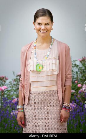 Isola Oland, Svezia. 14 Luglio, 2013. La principessa ereditaria Victoria festeggiare il suo 36o compleanno presso il cortile svedese della residenza estiva della Famiglia Reale Solliden, sull' isola Oland, Svezia, 14 luglio 2013. Foto: Patrick van Katwijk /dpa/Alamy Live News / /dpa/Alamy Live News Foto Stock