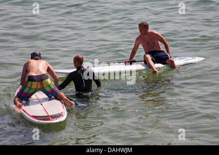 Bournemouth, Regno Unito 14 luglio 2013. Mantenere la freddezza anche in vertiginoso aumento temperature a Bournemouth Beach Credito: Carolyn Jenkins/Alamy Live News Foto Stock