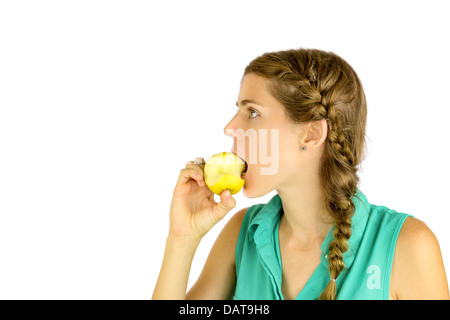 Mangiare sano: Ragazza tenendo un morso di un apple. Foto Stock