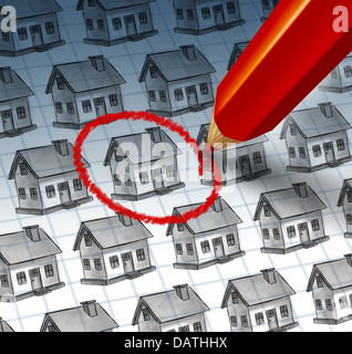 La scelta di una casa e casa concetto di ricerca con una matita rossa crayon evidenziando un disegno da un gruppo di case come un simbolo di trovare la perfetta residenza familiare e conseguire immobiliare di successo. Foto Stock