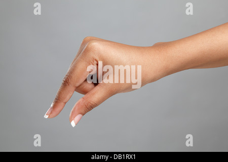 Donna con le mani in mano il gesto di prelievo Foto Stock