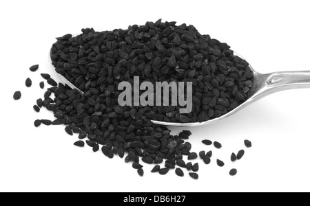 Nigella o cumino nero su un cucchiaio Foto Stock