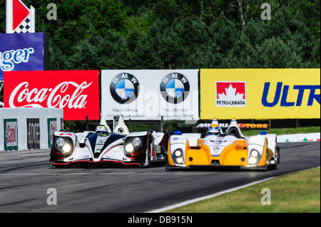 BOWMANVILLE, può., 21 lug 2013 - Il P1 classe vincente Latte Muscolo n. 6 azionata dal team di Klaus Graf e Lucas Luhr durante l'American Le Mans Racing warm-up presso la Mobil 1 SportsCar Grand Prix al Canadian Tire Motorsport Park (precedentemente noto come Mosport Raceway) Foto Stock