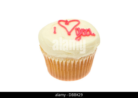 Appena sfornati tortina con le parole " ti amo' scritto in la ciliegina sulla torta. Foto Stock