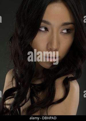 Bella donna asiatica nel suo ventenne Foto Stock