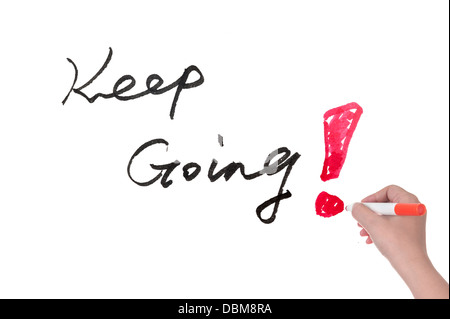 La scrittura a mano continuate parole su una lavagna bianca Foto Stock