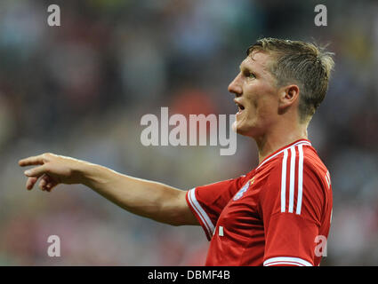 Monaco di Baviera, Germania. 01 Ago, 2013. Monaco di Baviera Bastian SCHWEINSTEIGER gesti durante la Audi Cup Soccer match finale FC Bayern Monaco vs Manchester City FC a stadio Allianz Arena di Monaco di Baviera, Germania, 01 agosto 2013. Foto: Andreas Gebert/dpa/Alamy Live News Foto Stock