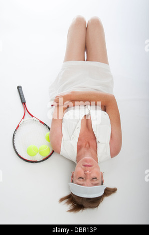 Femmina giocatore di tennis recante sulla sua schiena Foto Stock