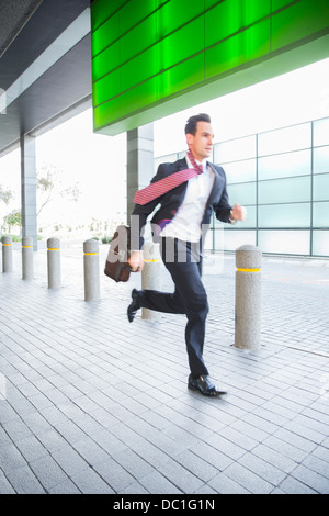 Imprenditore in esecuzione Foto Stock