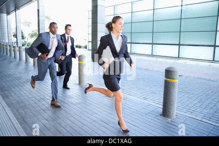 La gente di affari in esecuzione Foto Stock