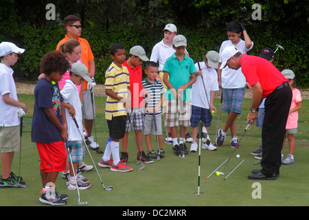 Florida Weston, Fort ft. Lauderdale,Bonaventure Country Club,ragazzo ragazzi ragazza maschio,ragazze femmina bambini ispanici uomo uomini maschio,insegnante,insegnanti,instr Foto Stock