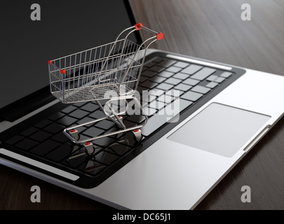 Computer immagine generata del carrello sul computer portatile. L'E-commerce concetto. Foto Stock