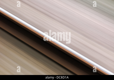 Abstract rotaia singola in motion blur ferroviari veloci Foto Stock