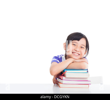 Felice bambina con libri Foto Stock