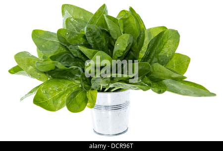 Porzione di spinaci isolati su sfondo bianco Foto Stock