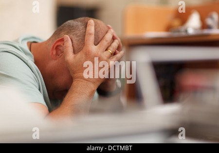 Egli ha perso tutti i suoi lavori Foto Stock