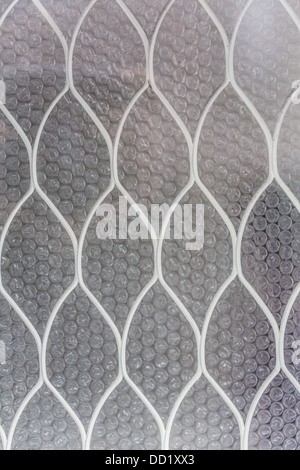 Bubble wrap foglio utile come sfondo. Foto Stock