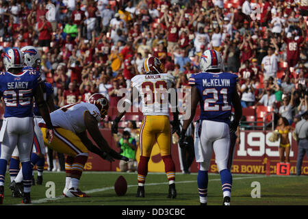 Sabato 24 Agosto, 2013, Washington Redskins ospita le fatture della Buffalo di FedEx Campo in Landover Maryland per il terzo gioco di preseason. Washington Redskins vincere 30-7. Bacarii Rambo # 29 affronta le bollette Quarterback Kevin Kolb # 4. Credito: Khamp Sykhammountry/Alamy Live News Foto Stock