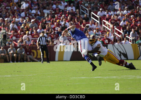 Sabato 24 Agosto, 2013, Washington Redskins ospita le fatture della Buffalo di FedEx Campo in Landover Maryland per il terzo gioco di preseason. Washington Redskins vincere 30-7. Bacarii Rambo # 29 affronta le bollette Quarterback Kevin Kolb # 4. Credito: Khamp Sykhammountry/Alamy Live News Foto Stock