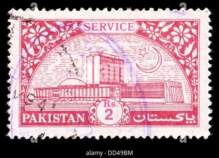 Francobollo dal Pakistan raffigurante l Assemblea Nazionale a Islamabad, rilasciati per ufficiali del governo USA. Foto Stock
