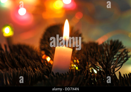 Christmas candle burning Foto Stock