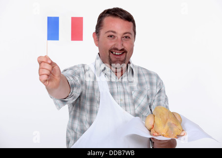 Il francese orgogliosamente sventolare la bandiera Foto Stock