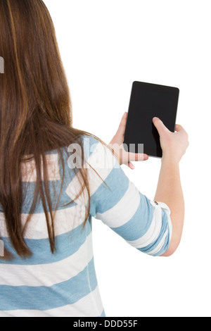 Immagine di una donna che usa un tablet pc da dietro Foto Stock