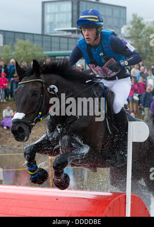 Malmo, Svezia. 31 Agosto, 2013. Svedese Ludwig eventer Svennerstal corre sul suo cavallo Shamwari durante il cross country concorrenza della Comunità Eventing Championships di Malmo, Svezia, 31 agosto 2013. Foto: JOCHEN LUEBKE/dpa/Alamy Live News Foto Stock