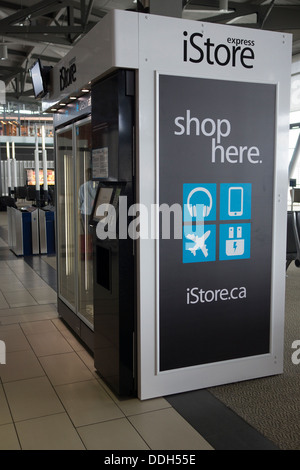 IStore Express macchina distributrice all'aeroporto con Apple Elettronica e accessori Foto Stock