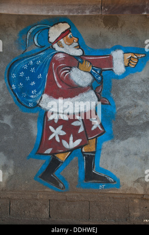 Santa Claus dipinta su una parete Foto Stock