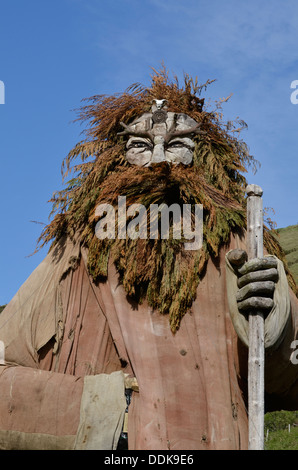 In legno intagliato statua di manannan sull' isola di Man Foto Stock