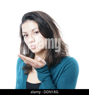 Ragazza adolescente soffia un bacio Foto Stock