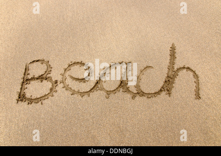 Scritto sulla spiaggia in sabbia Foto Stock