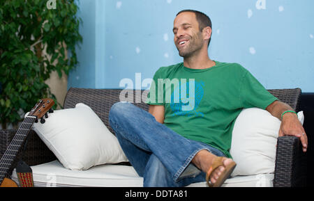 Monaco di Baviera, Germania. 06 Sep, 2013. Musicista americano Jack Johnson fornisce un'intervista a Monaco di Baviera, Germania, 06 settembre 2013. Foto: INGA KJER/dpa/Alamy Live News Foto Stock