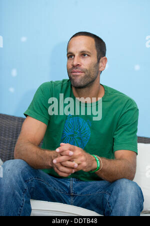 Monaco di Baviera, Germania. 06 Sep, 2013. Musicista americano Jack Johnson fornisce un'intervista a Monaco di Baviera, Germania, 06 settembre 2013. Foto: INGA KJER/dpa/Alamy Live News Foto Stock