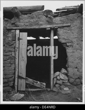 Taos County, Nuovo Messico. Il semi-astratti modelli di dettagli di abbandonato edifici adobe che ha . . . 521875 Foto Stock