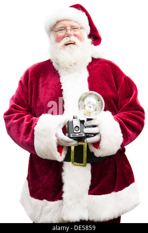 Santa Claus in possesso di una fotocamera vintage ride, guardando nella telecamera-isolato su bianco Foto Stock