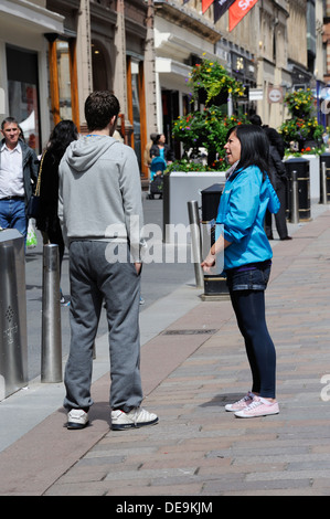 Chuggers o carità rapinatori in Glasgow Foto Stock