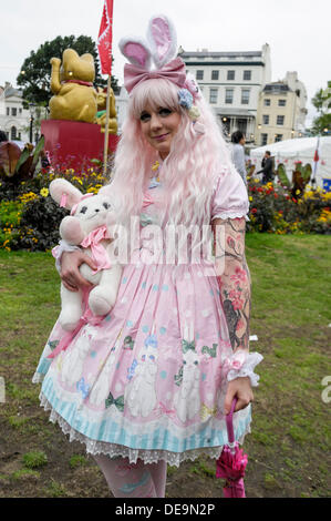 Brighton, Regno Unito, 14/09/2013 : La donna in una tipica giapponese 'cosplay' outfit assiste il Brighton Festival del Giappone. Foto di Julie Edwards Foto Stock