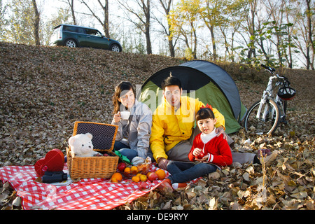 Famiglia in autunno Foto Stock