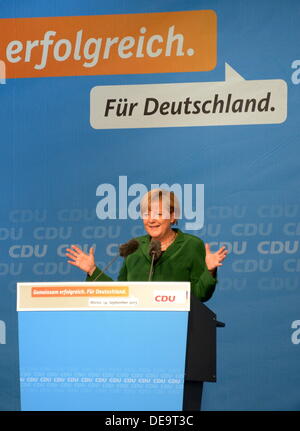 Mainz, Germania. Xiv Sep, 2013. Il cancelliere tedesco Angela Merkel parla a una campagna elettorale evento per il 2013 tedesco elezioni federali in Mainz, Germania, 14 settembre 2013. Il tedesco elezioni federali avrà luogo il 22 settembre 2013. Foto: Roland Holschneider/dpa/Alamy Live News Foto Stock