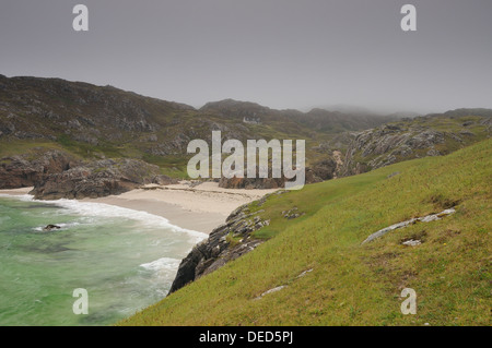 Spiaggia a: Achmelvich Bay, Assynt, Sutherland, a nord-ovest della Scozia Foto Stock